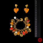 YVES SAINT LAURENT - 1980'S- BRACELET, PAIRE DE BOUCLES D'OREILLES